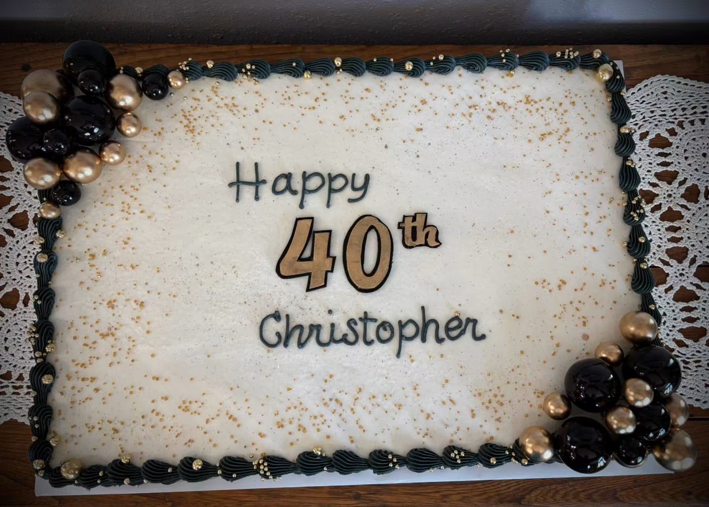 Cheers to 40: black, gold and white for Christopher